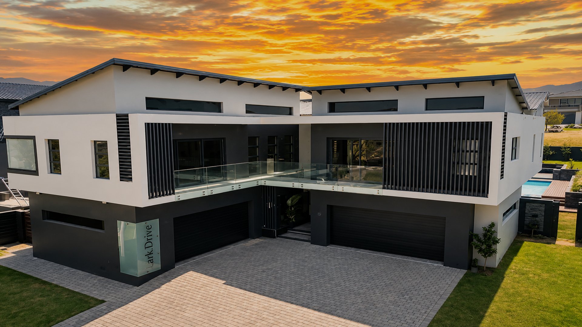 Modern luxury home construction at sunset